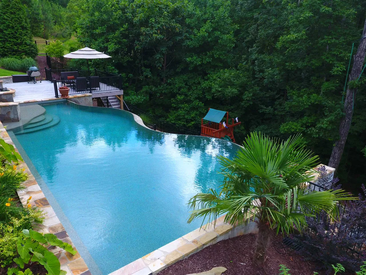 Award winning Vanishing edge - Luxury Pools by Hearthstone Luxury Pools + Outdoors