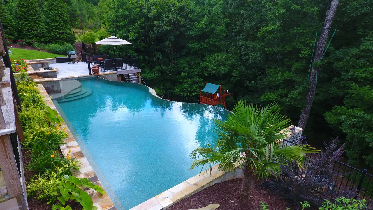 Marietta, GA luxury pool builders Marietta luxury pool and outdoor living design by Hearthstone
